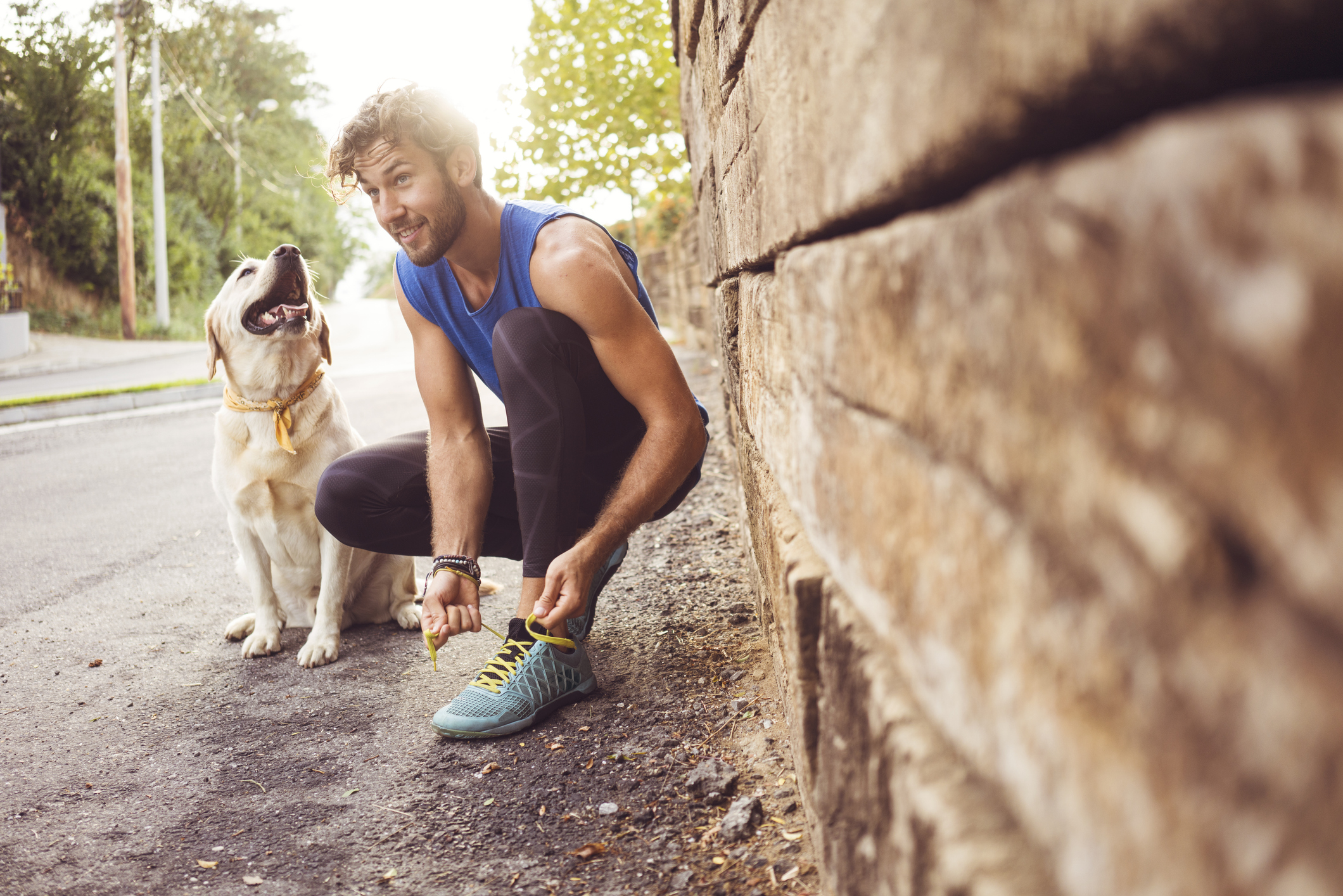 Man out for a jog with his dog