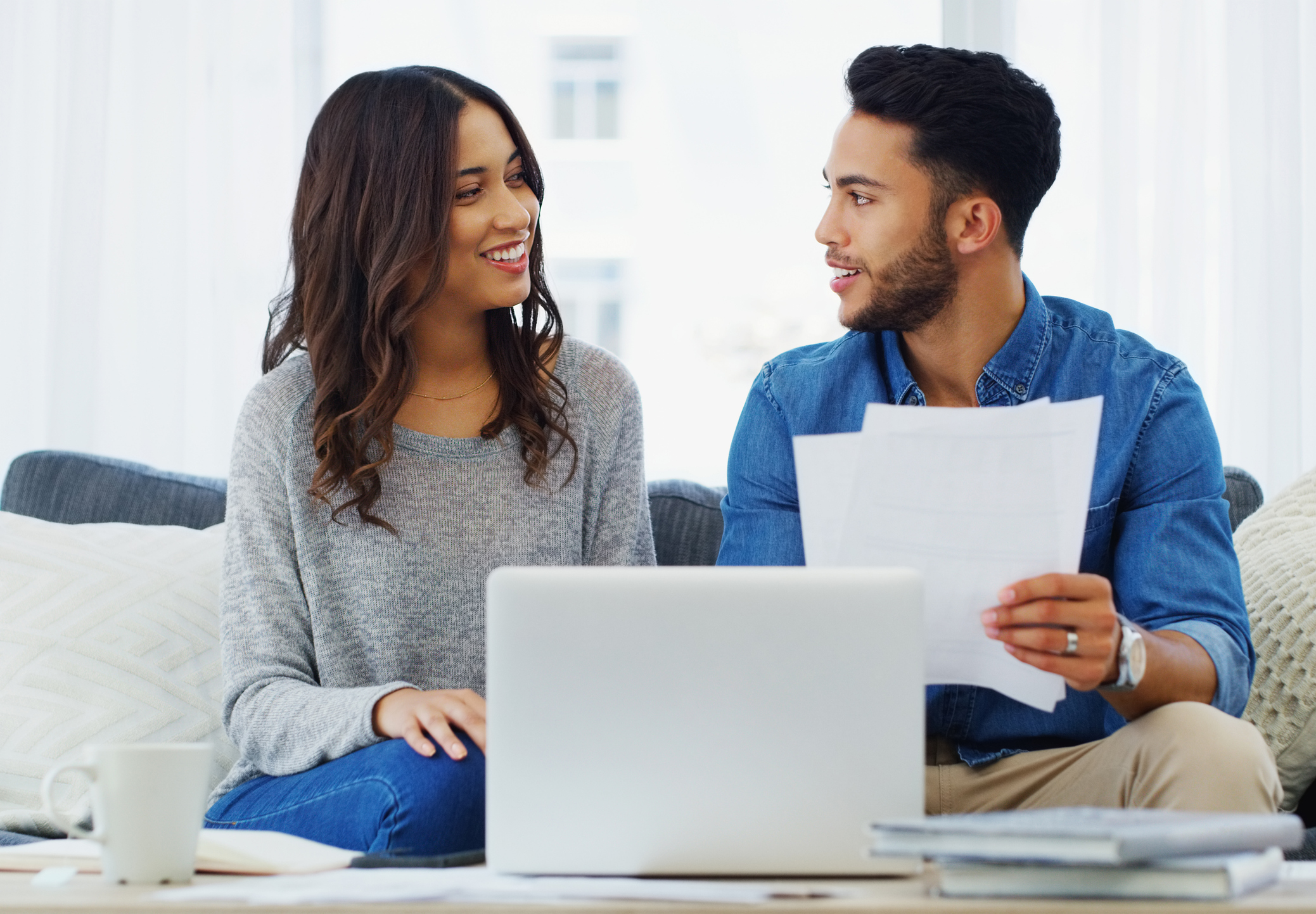 young couple reviewing finances