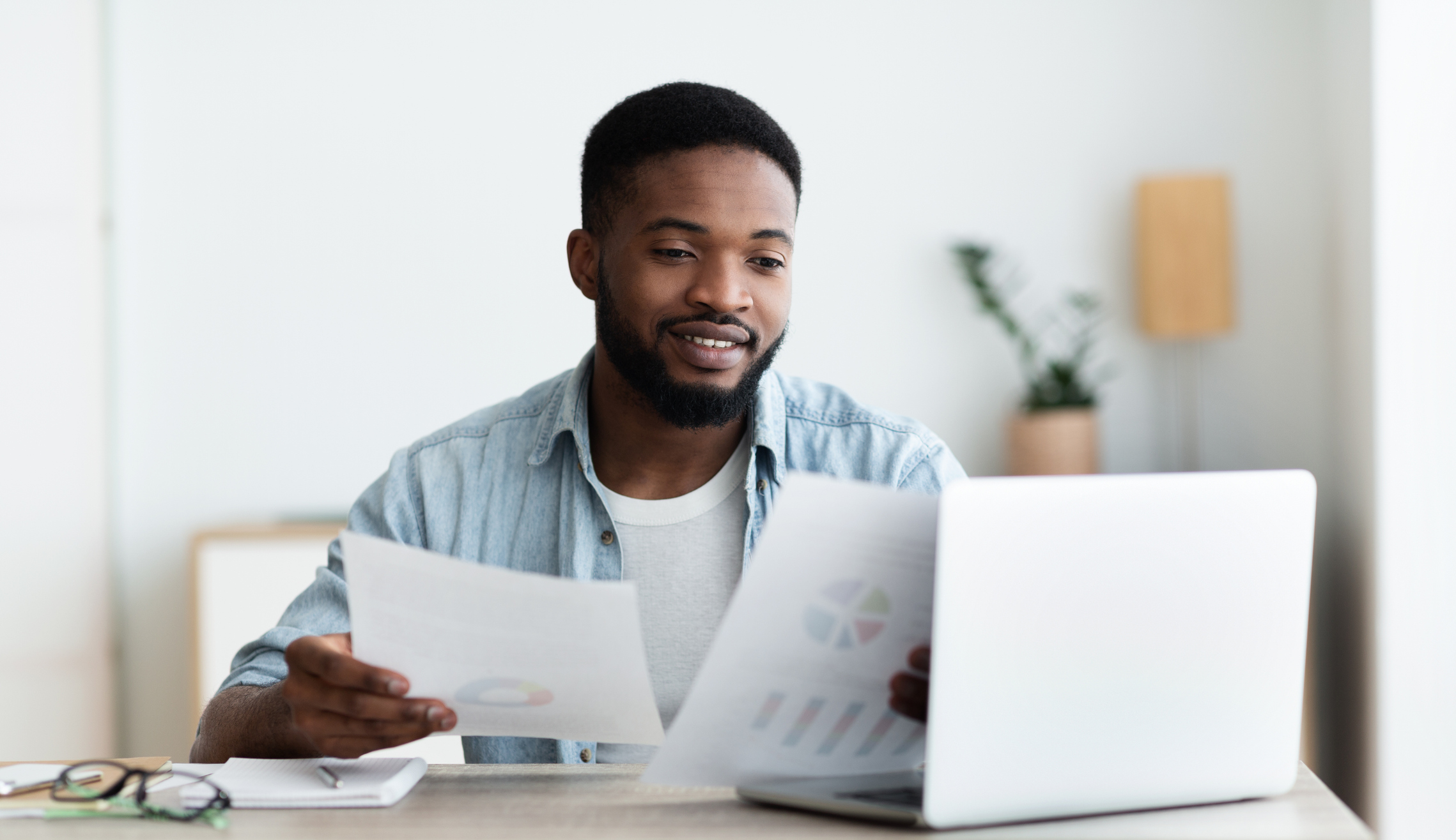 man reviewing paperwork